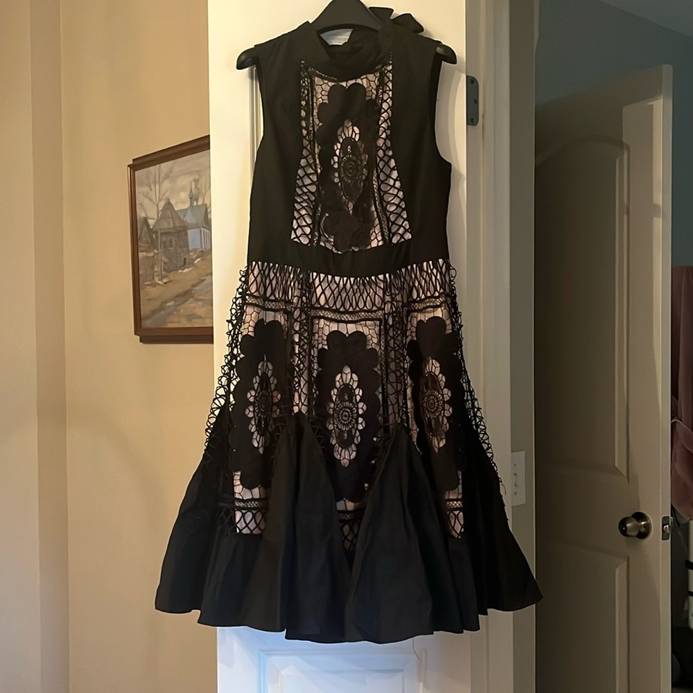 Gorgeous black dress, one of a kind. Unknown brand from a NYC boutique.